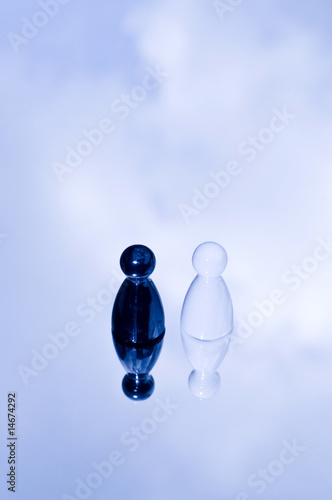 Photo: Black and white game counters Black and white game counters