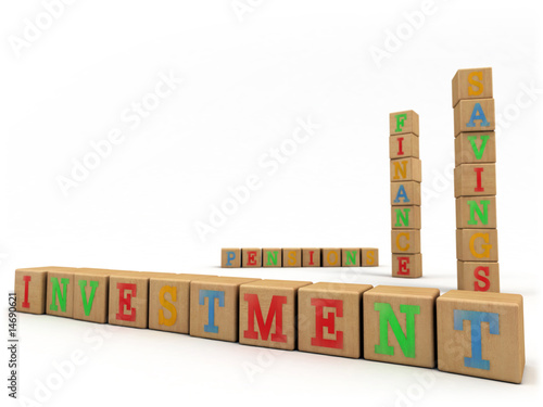 Photo: Investment concept - Child's play building blocks Investment concept - Child's play building blocks