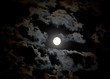 Full moon and clouds on night sky