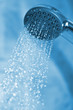 water flowing from metal shower