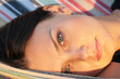 woman resting in hammock