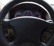 Illuminated dashboard and steering wheel of a modern car