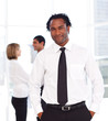 African businessman in the office with his team