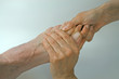 Reflexologist pulling on big toe