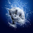 Water drops around men under water on blue background