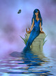 Blue Mermaid Sitting On A Pedastel In The Ocean