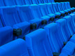 Dark blue rows of theater seats