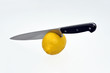 Kitchen knife and lemon