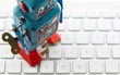 Photos : retro robot on a laptop