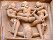Stone carved erotic sculptures in hindu Khajuraho temple, India