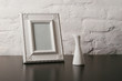 composition with vintage fotoframe and vase composition with vintage fotoframe and vase