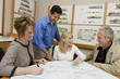 Two women meeting with architect and developer