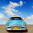 happy european seniors in oldtimer car on cuba happy european seniors in oldtimer car on cuba