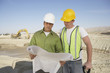 Construction Workers Reading Blueprints