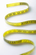 Winding strip of measuring tape, close-up