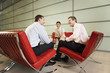 Smiling Businesspeople Having Meeting in office