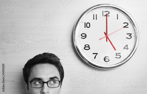 Photo: Businessmen and Clock Businessmen and Clock