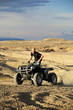 Photo: quad in hills - teen on four wheeler ATV quad in hills - teen on four wheeler ATV