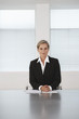 Business Executive Sitting in Boardroom