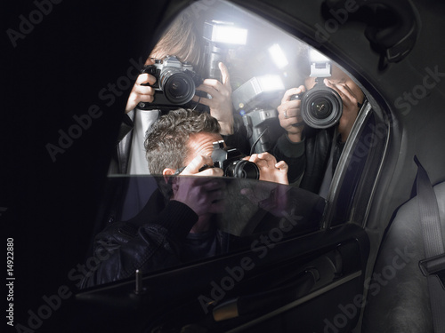 Paparazzi shooting through car window