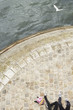Couple Relaxing by canal, low section, view from above