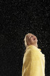 Laughing Woman Wrapped in Towel Standing in Rain