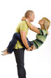 Photo: young man holding his girlfriend in the air young man holding his girlfriend in the air