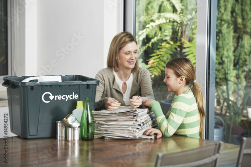 Photo: Woman and Girl Collecting Recyclables Woman and Girl Collecting Recyclables