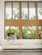 Affectionate Young Couple Hugging on Sofa