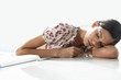 Foto: Woman Resting on Desk Woman Resting on Desk