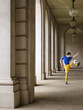 Foto: Soccer player kicking ball in portico Soccer player kicking ball in portico
