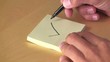 Video: man makes a check mark on a piece of paper man makes a check mark on a piece of paper