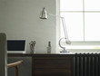Desk with laptop and lamp