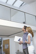 Couple observing new home