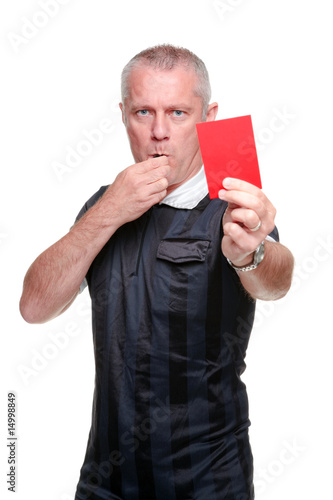 Foto: Football referee showing the red card Football referee showing the red card