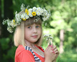 The girl in a flower wreath.