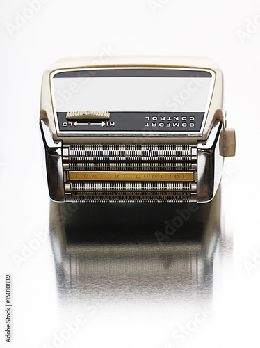 Photo: Electric shaver, view from above, studio shot Electric shaver, view from above, studio shot