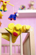 Crib with toys, focus on foreground