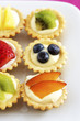 Close-up of mini fruit cupcakes, elevated view