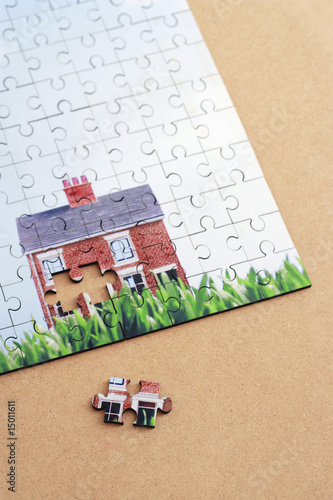 Jigsaw puzzle with house, elevated view