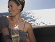 Woman Drinking Champagne on Boat