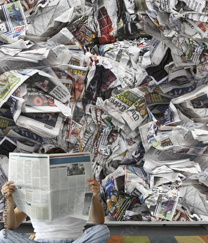 Photo: Man Reading Newspaper Man Reading Newspaper
