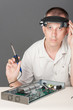 Engineer repairing circuit board