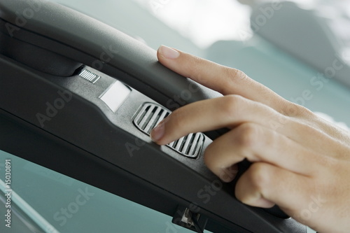 Photo: Closeup of woman's hand on telephone Closeup of woman's hand on telephone