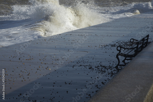 Photo: Water crashing on cement pier Water crashing on cement pier