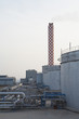 Fuel depot at power station with smokestack in background