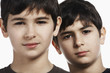 Twin boys 13-15, close-up, portrait