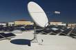 Satellite Dish with Solar Panels at Solar Power Plant