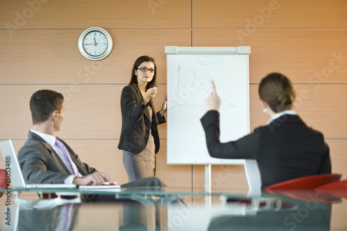 Photo: Businesswoman giving a presentation Businesswoman giving a presentation