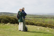 Young Couple Standing in a Field